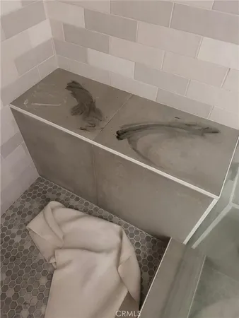 a bathroom with a toilet and a sink