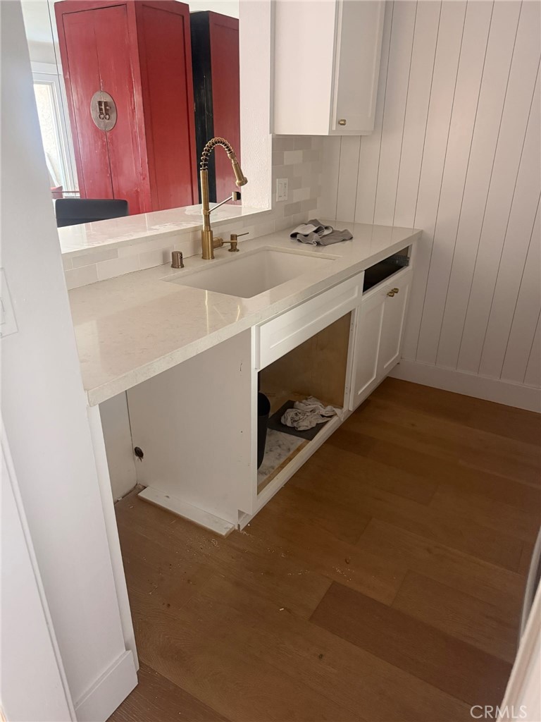8740 Tuscany Avenue, Unit 211 Playa del Rey, CA 90293 - Photo 18 of 24 a room with a sink and a mirror