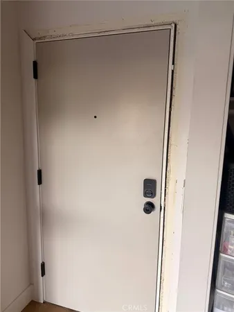 a bathroom with a glass shower door