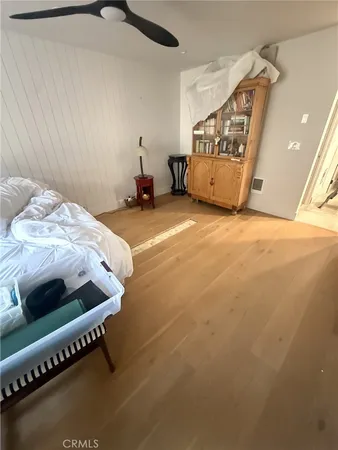 a bed room with a bed and a fish tank