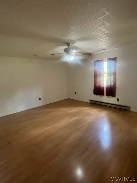 5711 Thweatt Drive Disputanta, VA 23842 - Photo 12 of 19 an empty room with a empty space and windows