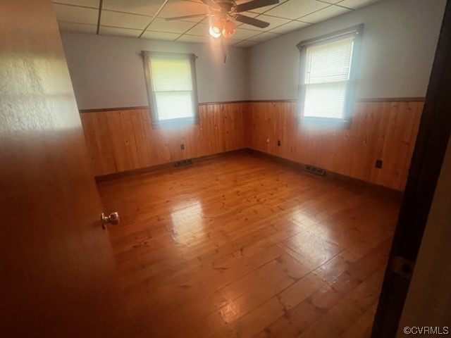 5711 Thweatt Drive Disputanta, VA 23842 - Photo 9 of 19 an empty room with windows and entrance