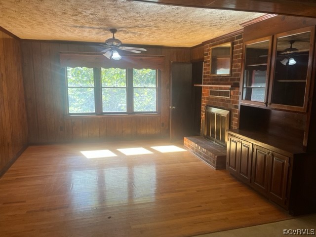 5711 Thweatt Drive Disputanta, VA 23842 - Photo 10 of 19 a view of empty room with wooden floor and fan