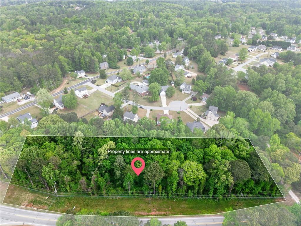 a view of a multi story yard with green space