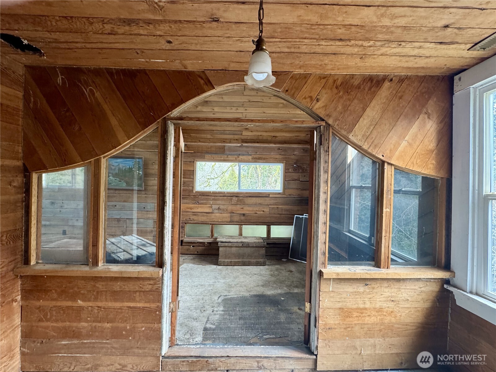 7513 Robe Menzel Road Granite Falls, WA 98252 - Photo 16 of 31 a view of a porch with a table and chairs