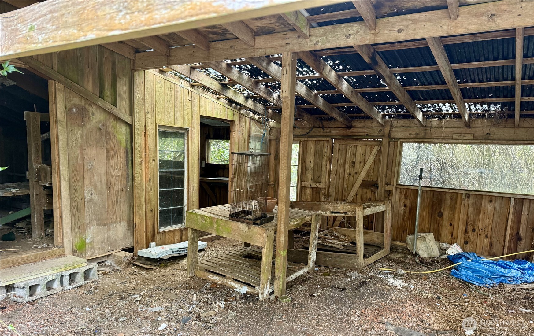 7513 Robe Menzel Road Granite Falls, WA 98252 - Photo 30 of 31 a view of a patio with table and chairs