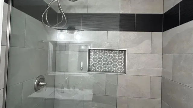 a bathroom with a sink and a window