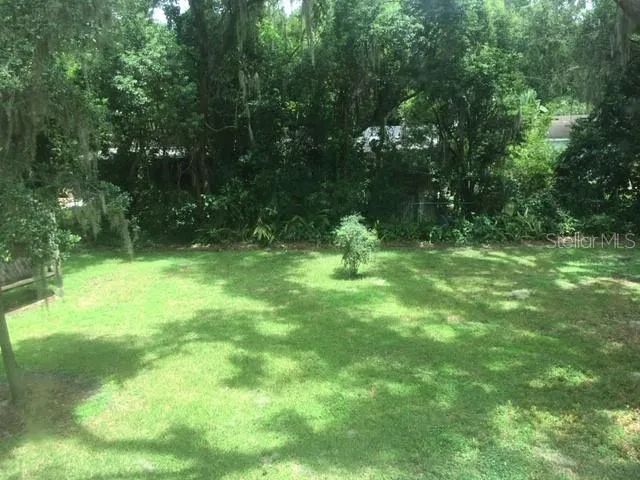 a view of outdoor space and a yard