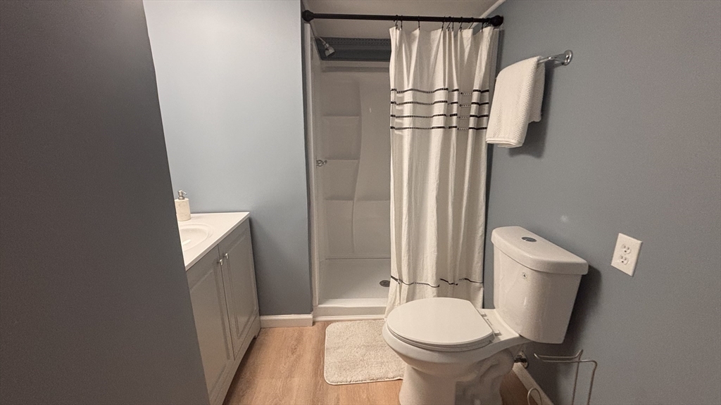 229 Miller Street, Unit 3G Ludlow, MA 01056 - Photo 8 of 15 a bathroom with a sink toilet and shower