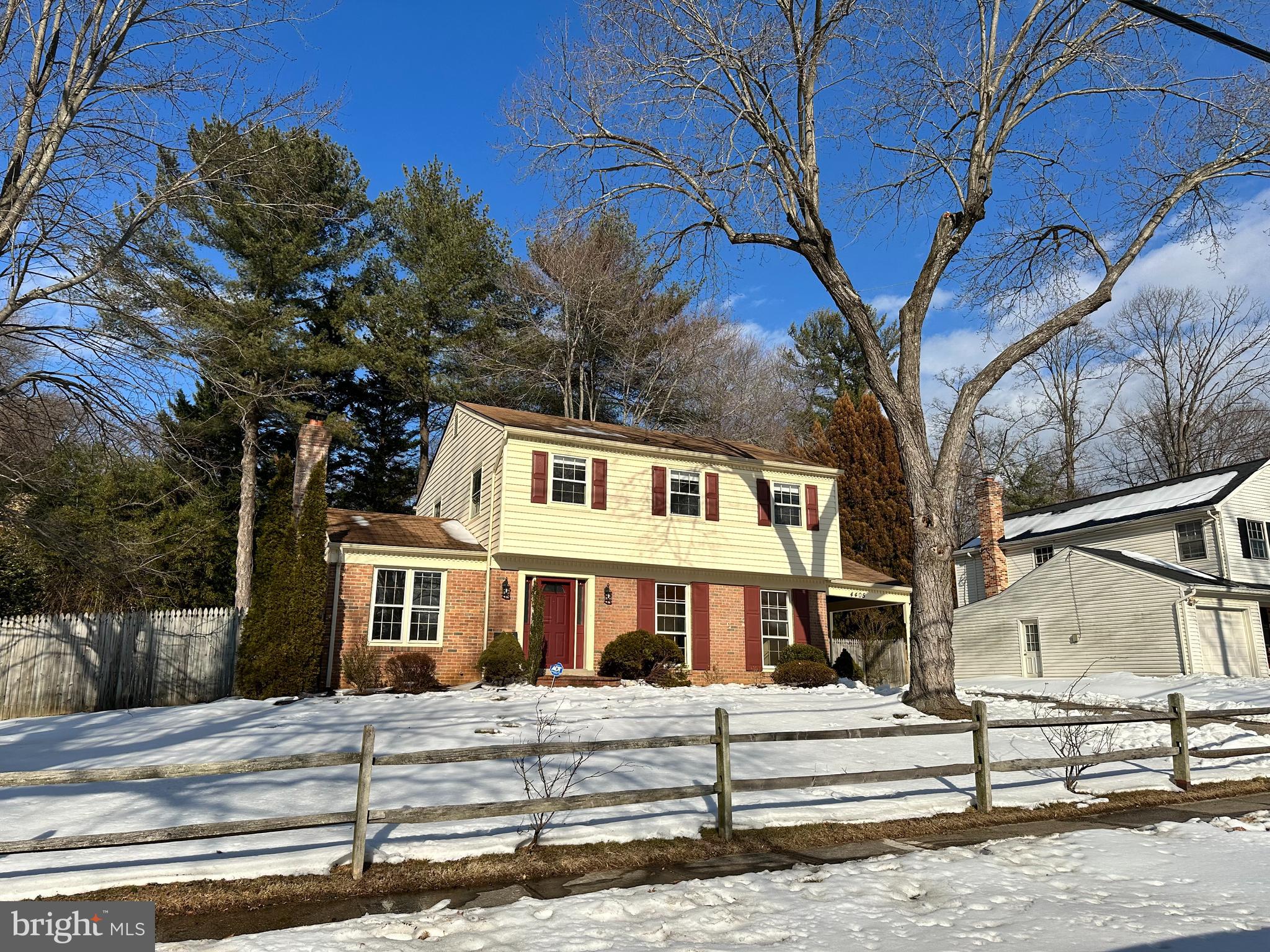 4405 Bel Pre Road Rockville, MD 20853 - Photo 1 of 24 a front view of a house with a yard