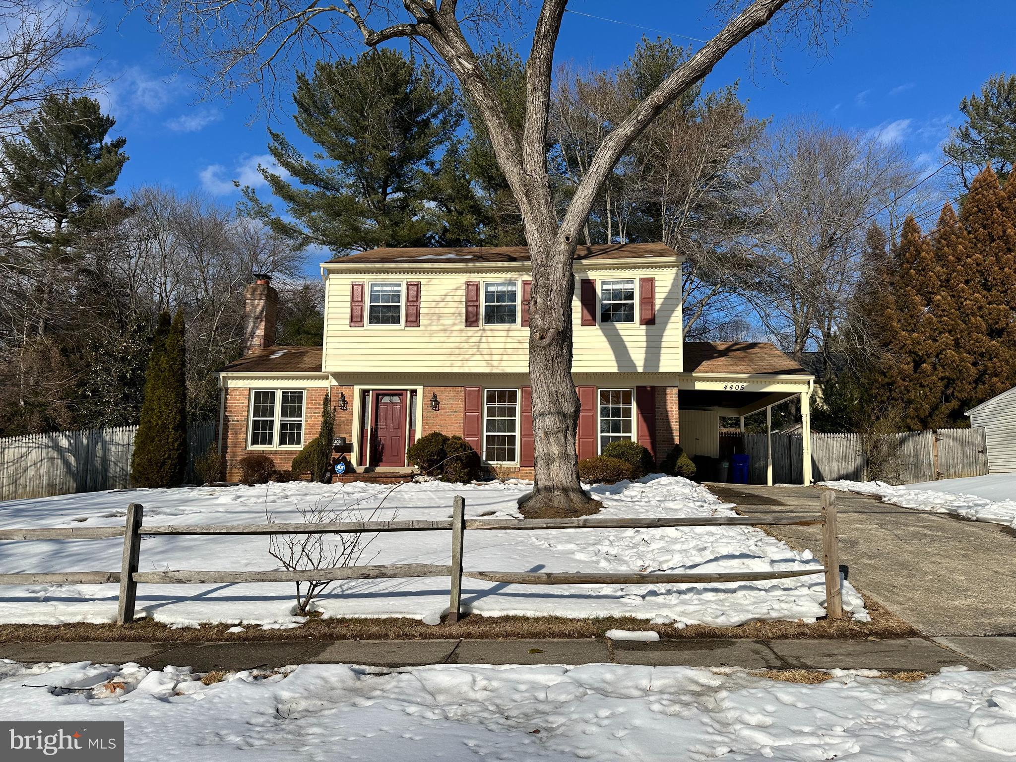 4405 Bel Pre Road Rockville, MD 20853 - Photo 24 of 24 a view of a white house with large windows and a tree
