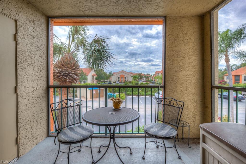 13545 Eagle Ridge Drive, Unit 827 Fort Myers, FL 33912 - Photo 25 of 27 a view of a city from a dining room