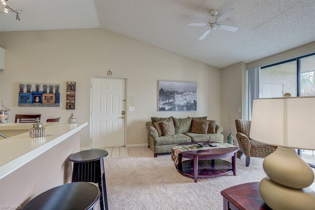 13545 Eagle Ridge Drive, Unit 827 Fort Myers, FL 33912 - Photo 6 of 27 a living room with furniture