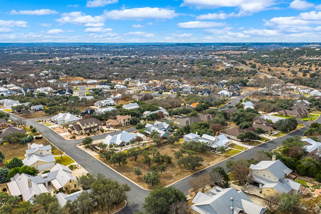2330 Summit Forest, Unit 280R Fredericksburg, TX 78624 - Photo 8 of 10 an aerial view of residential houses with outdoor space