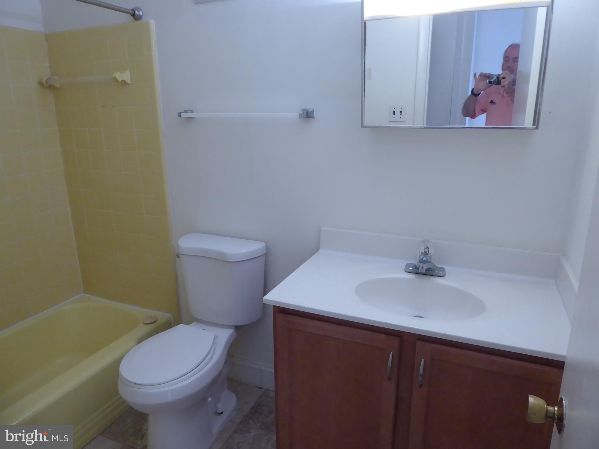 6129 Rivanna Drive Springfield, VA 22150 - Photo 8 of 11 a bathroom with a sink and a toilet