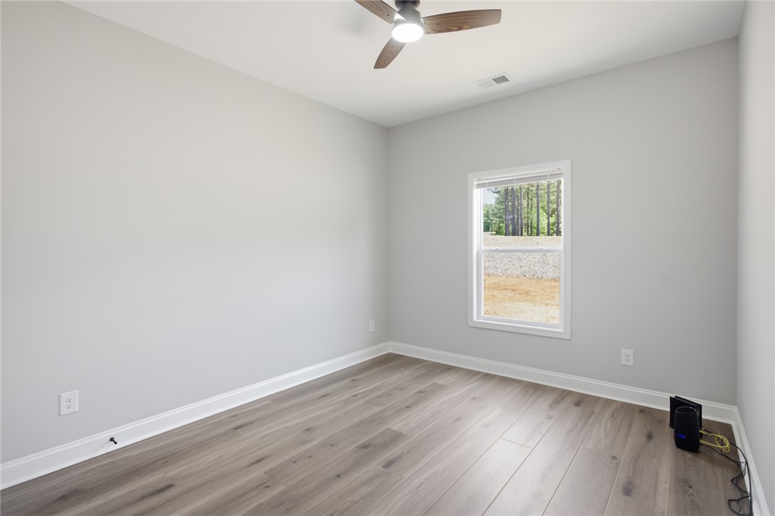 912 Watercrest Road West Union, SC 29696 - Photo 30 of 49 This bright room features a large window, offering abundant natural light and peaceful views.
