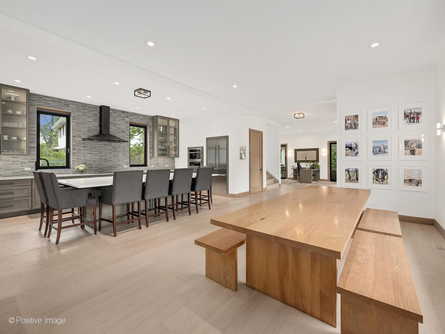 11670 79th Street Burr Ridge, IL 60527 - Photo 13 of 31 a dining hall with stainless steel appliances kitchen island a stove a table and chairs