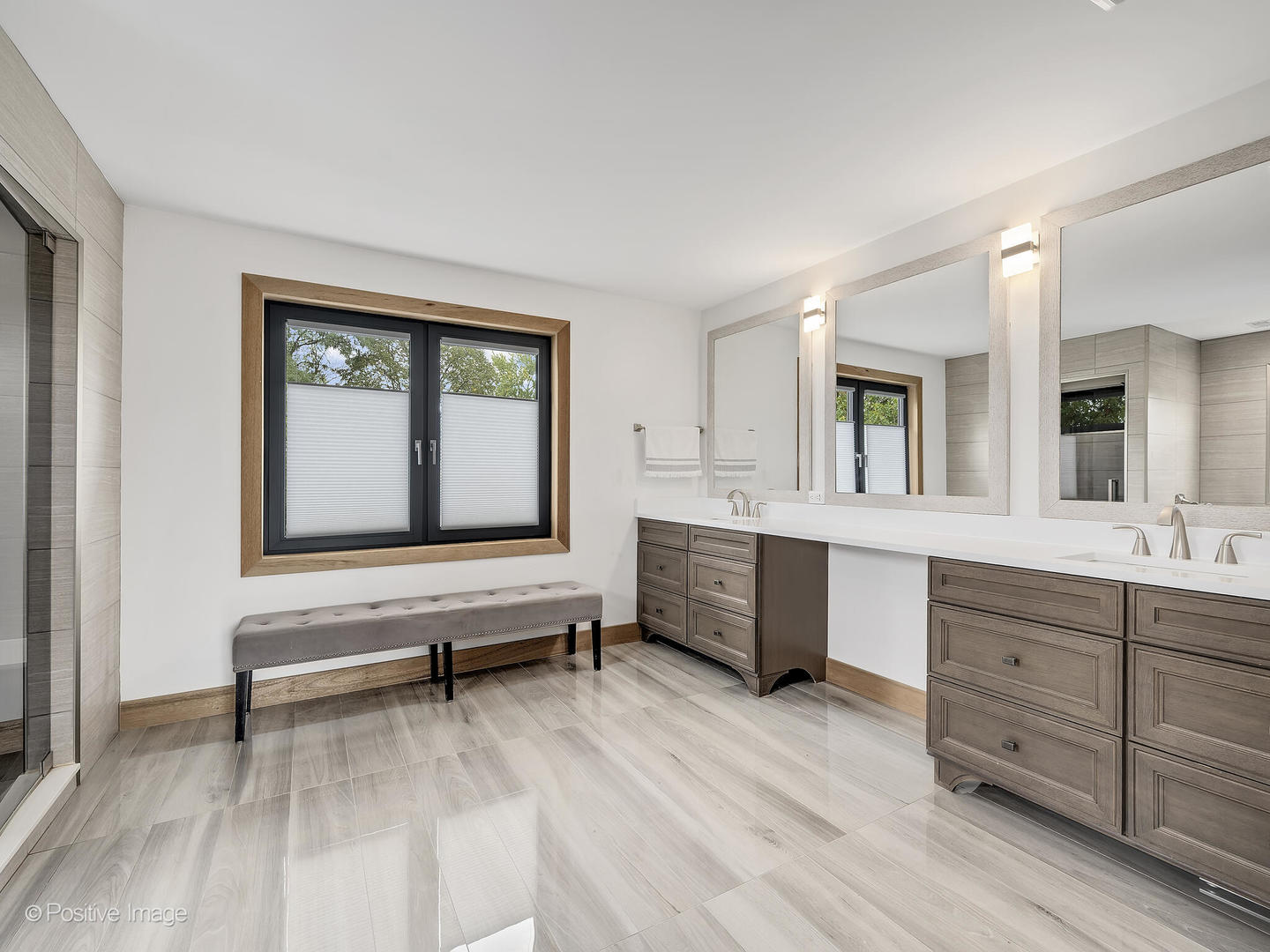 11670 79th Street Burr Ridge, IL 60527 - Photo 18 of 31 a en suite bathroom with a sink a mirror and a wooden floor