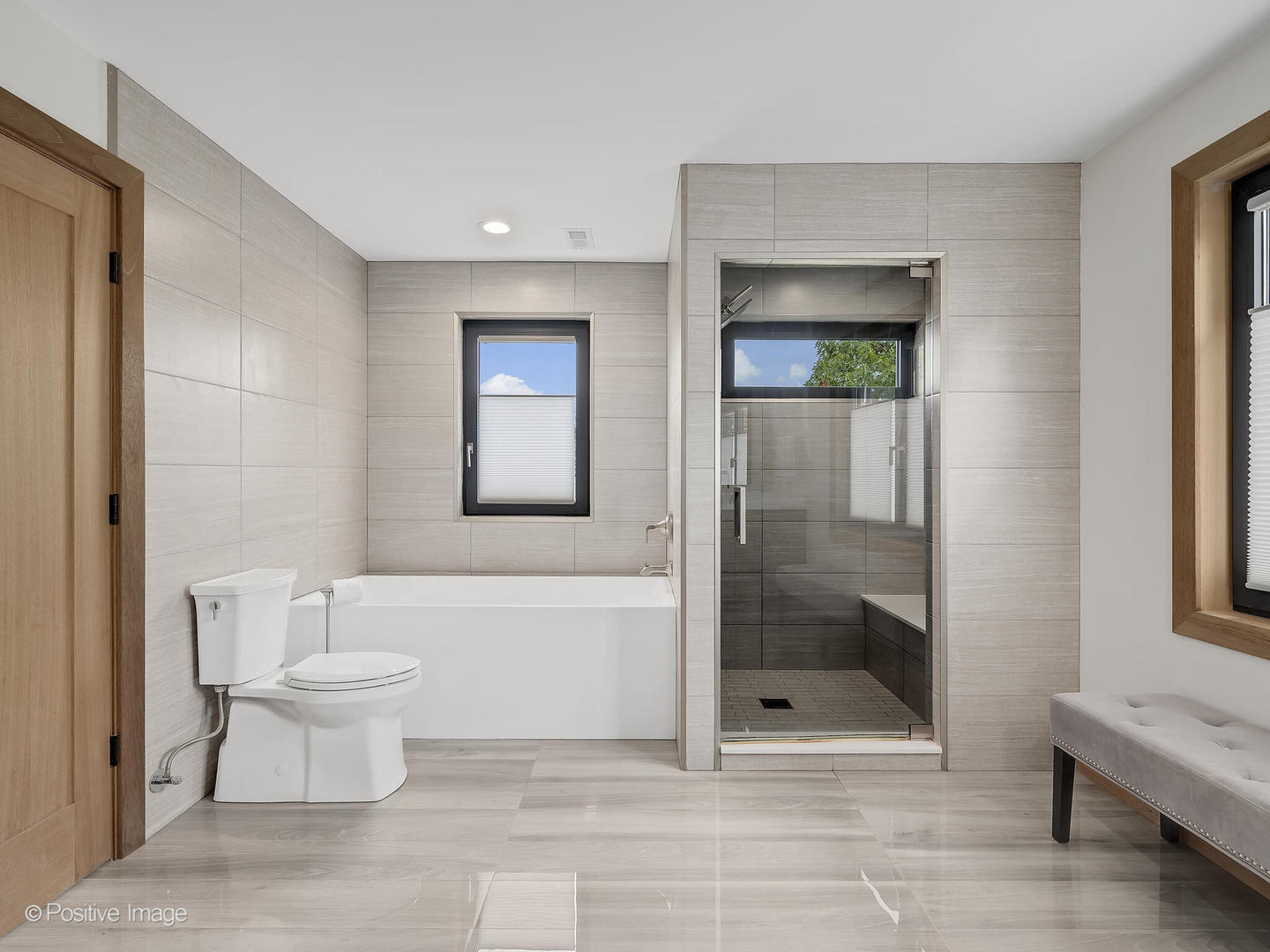 11670 79th Street Burr Ridge, IL 60527 - Photo 19 of 31 a bathroom with a toilet and a shower