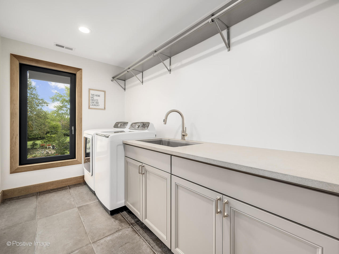 11670 79th Street Burr Ridge, IL 60527 - Photo 25 of 31 a kitchen with a sink and a mirror