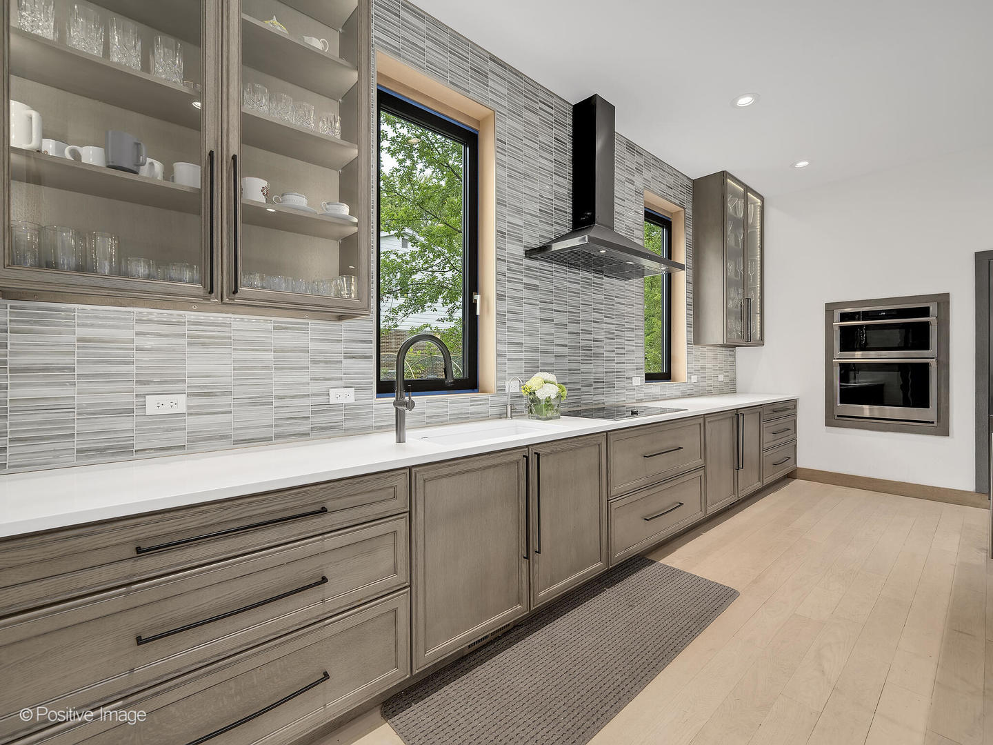 11670 79th Street Burr Ridge, IL 60527 - Photo 7 of 31 a spacious bathroom with double vanity and a large mirror