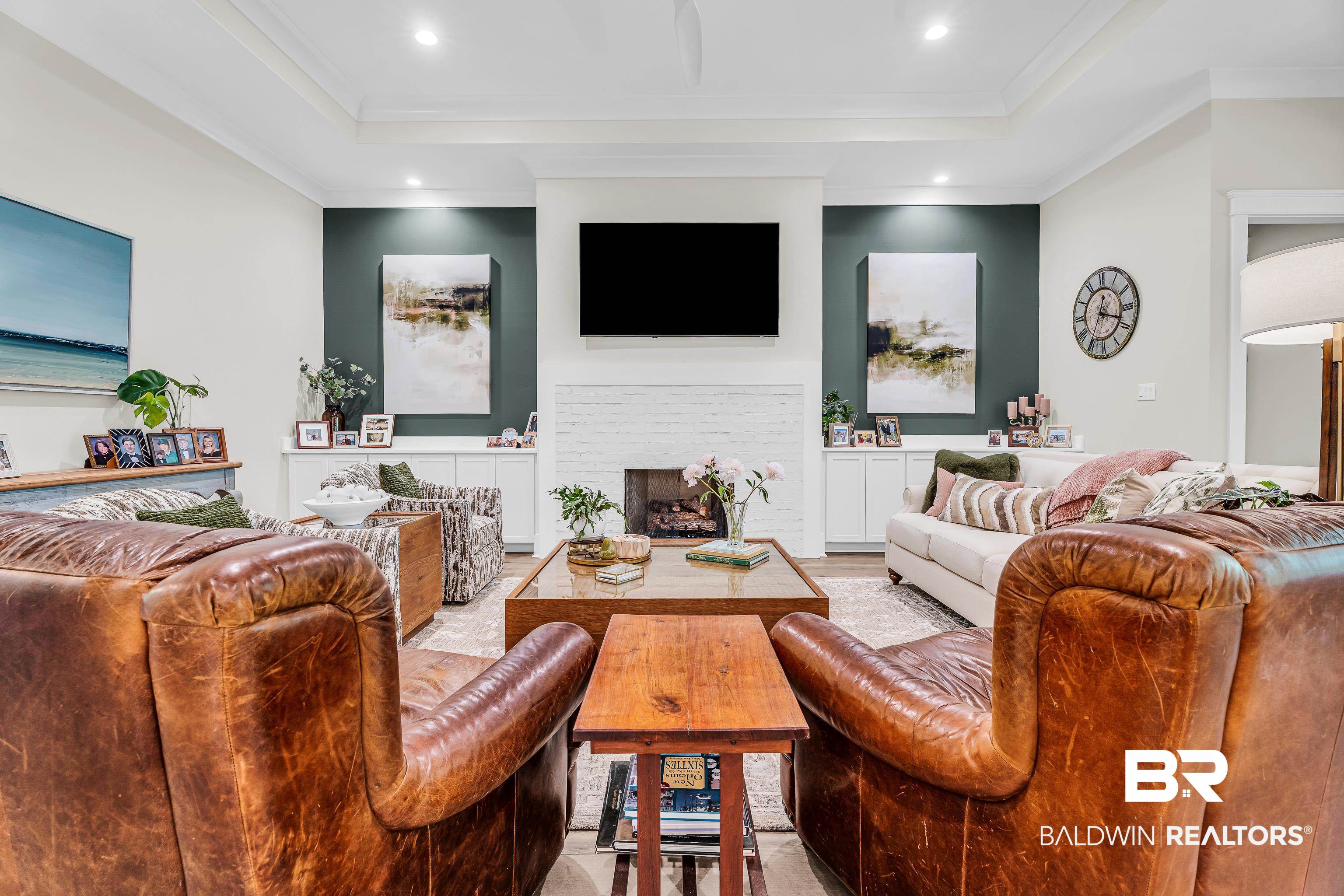 17541 Polo Ridge Boulevard Fairhope, AL 36532 - Photo 6 of 19 Living area featuring a white brick fireplace, built-in cabinetry, and recessed lighting