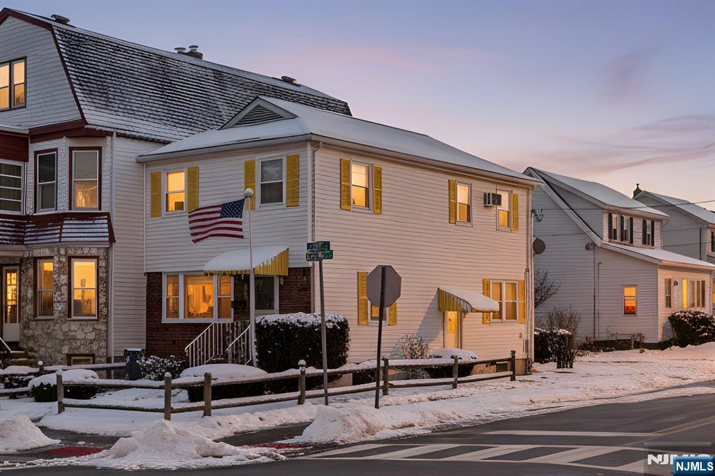 a front view of a building with street view