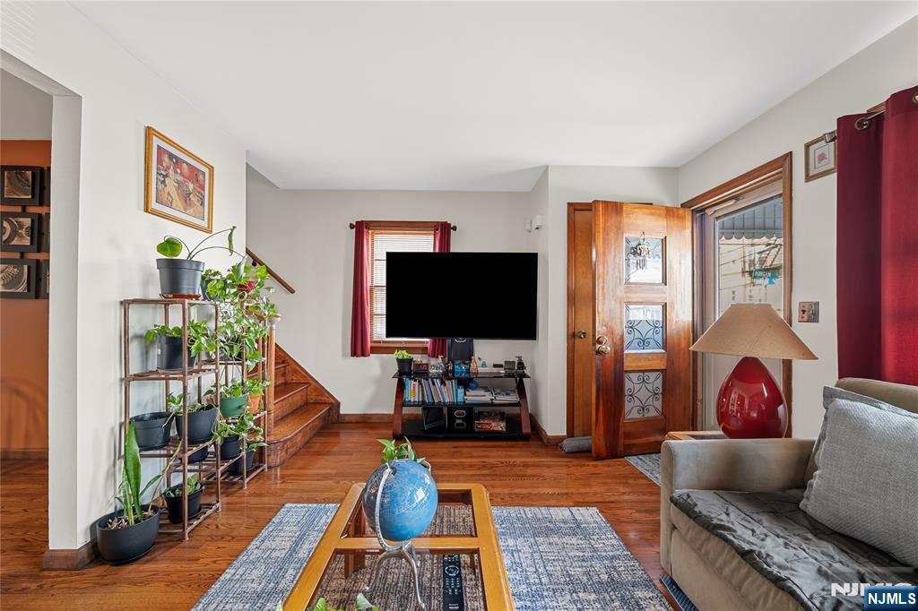 29 Harding Avenue North Arlington, NJ 07031 - Photo 12 of 44 a living room with furniture and a flat screen tv