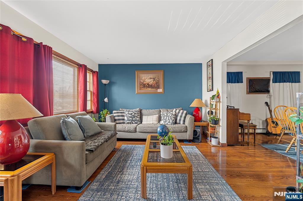 29 Harding Avenue North Arlington, NJ 07031 - Photo 14 of 44 a living room with furniture and a flat screen tv