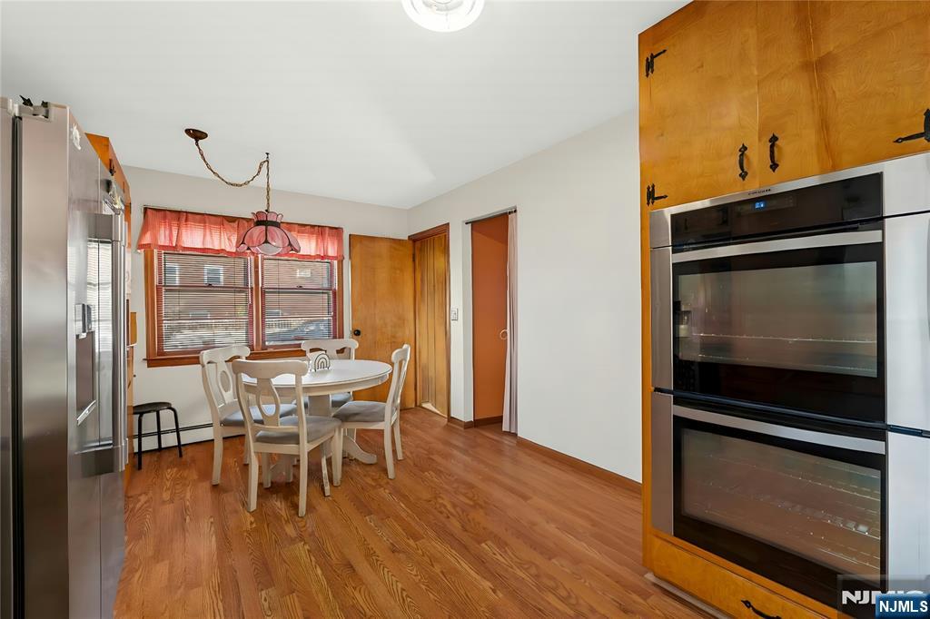 29 Harding Avenue North Arlington, NJ 07031 - Photo 18 of 44 a view of a dining room with furniture window and outside view
