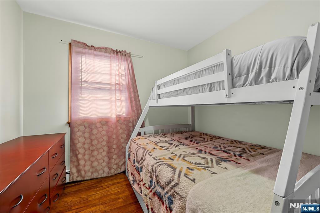 29 Harding Avenue North Arlington, NJ 07031 - Photo 22 of 44 a bedroom with a bed and a window
