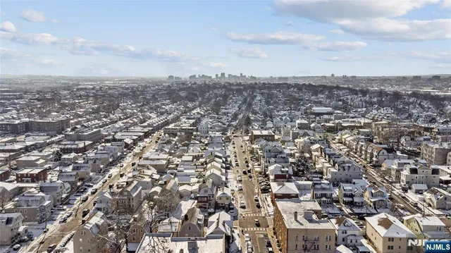 a view of a building with sitting area