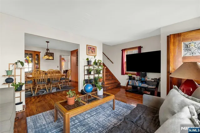 a very nice looking dining room with a table and chairs
