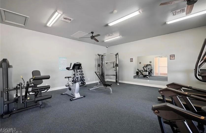 10749 Crossback Lane Lehigh Acres, FL 33974 - Photo 19 of 21 a view of a room with gym equipment