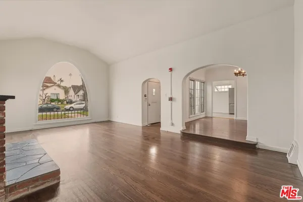 a view of gallery with wooden floor