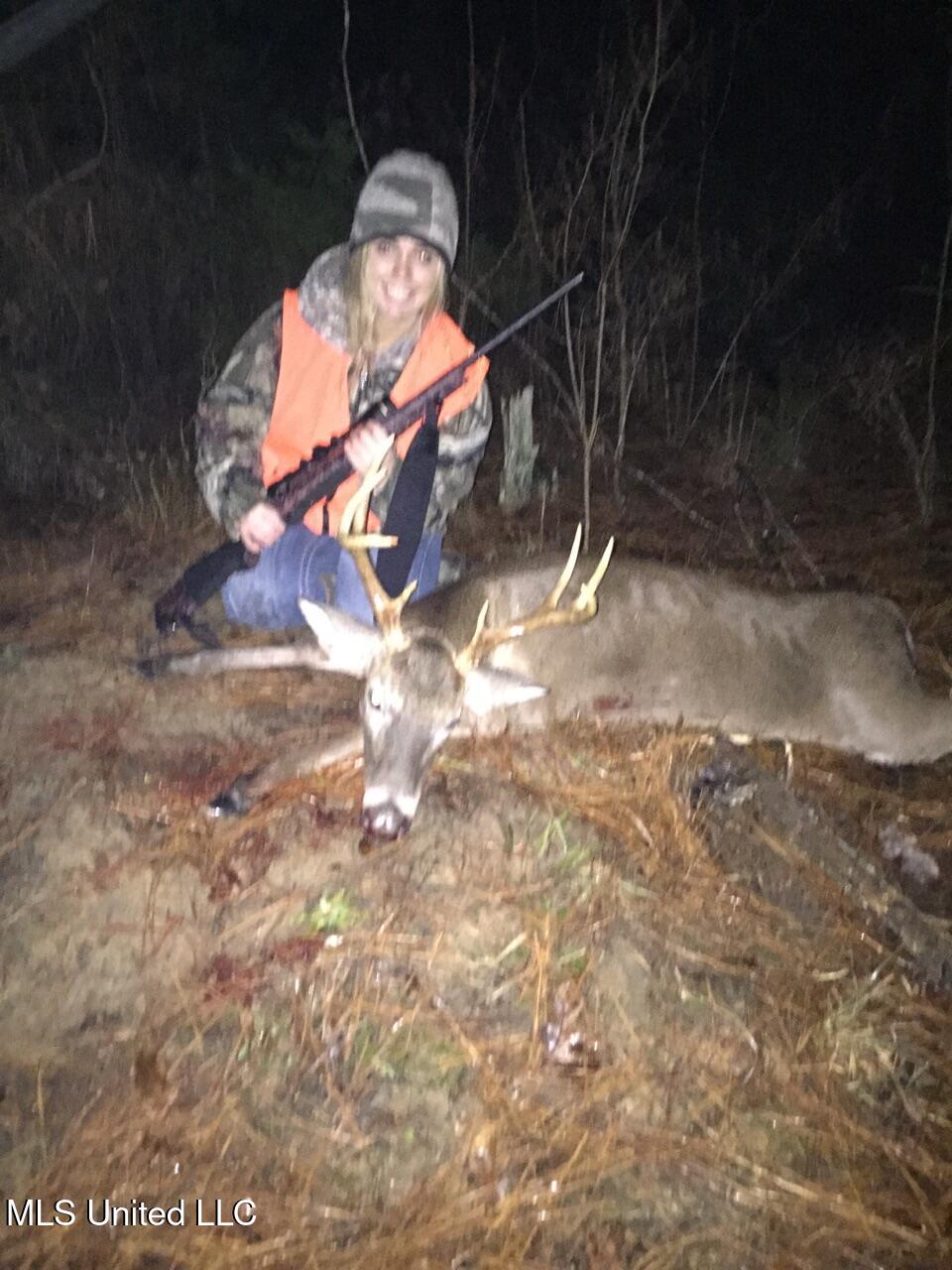 593 Rocky Hill Road Pickens, MS 39146 - Photo 20 of 102 Lady with deer