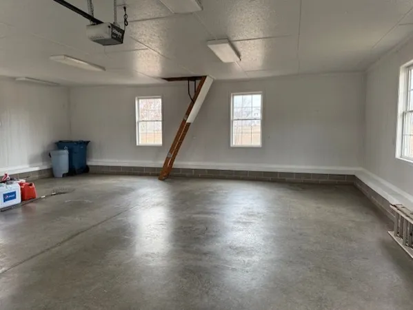 a room with hard wood flooring and furniture