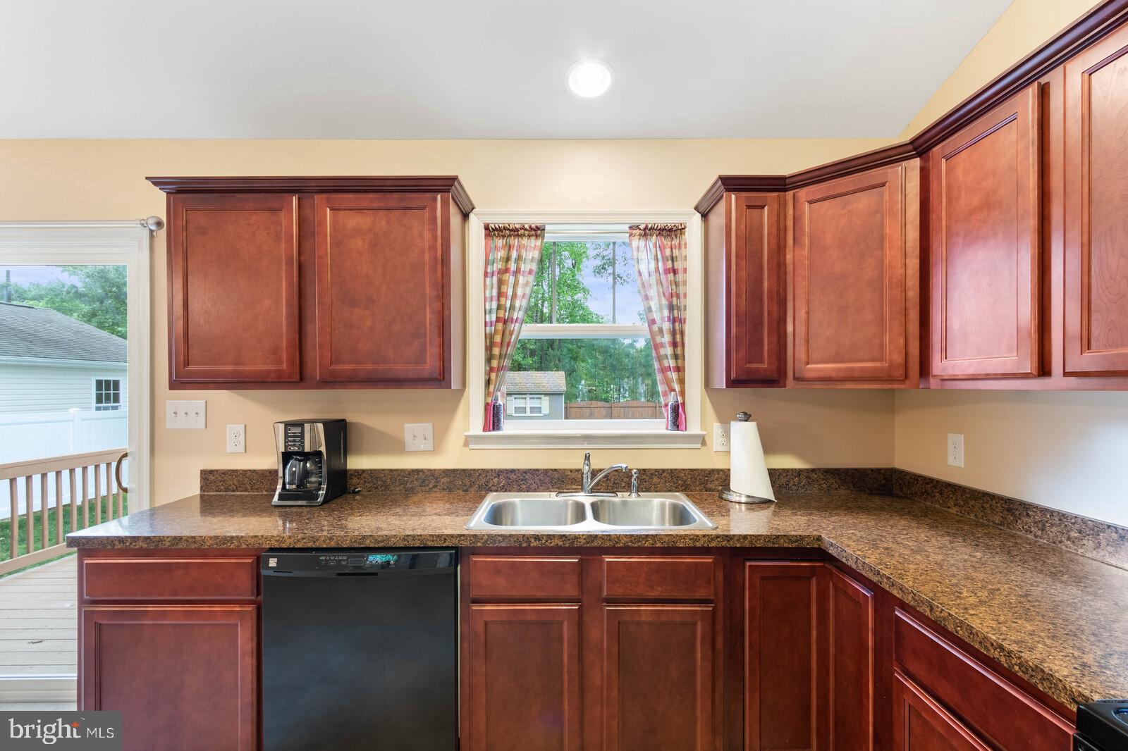 219 Rolando Drive Colonial Beach, VA 22443 - Photo 13 of 43 Cabinets in like new condition.