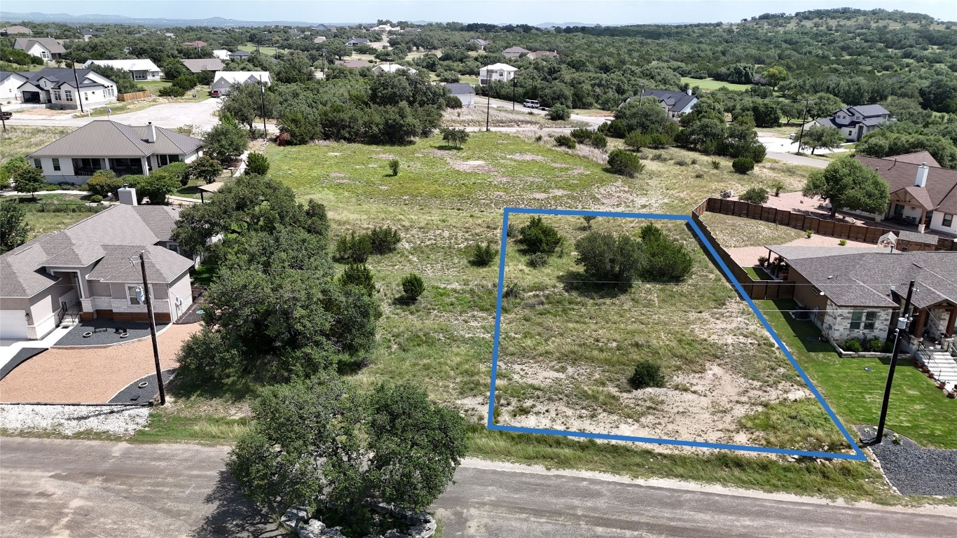 225 Jeff Vaughn Blanco, TX 78606 - Photo 9 of 9 an aerial view of residential houses with outdoor space
