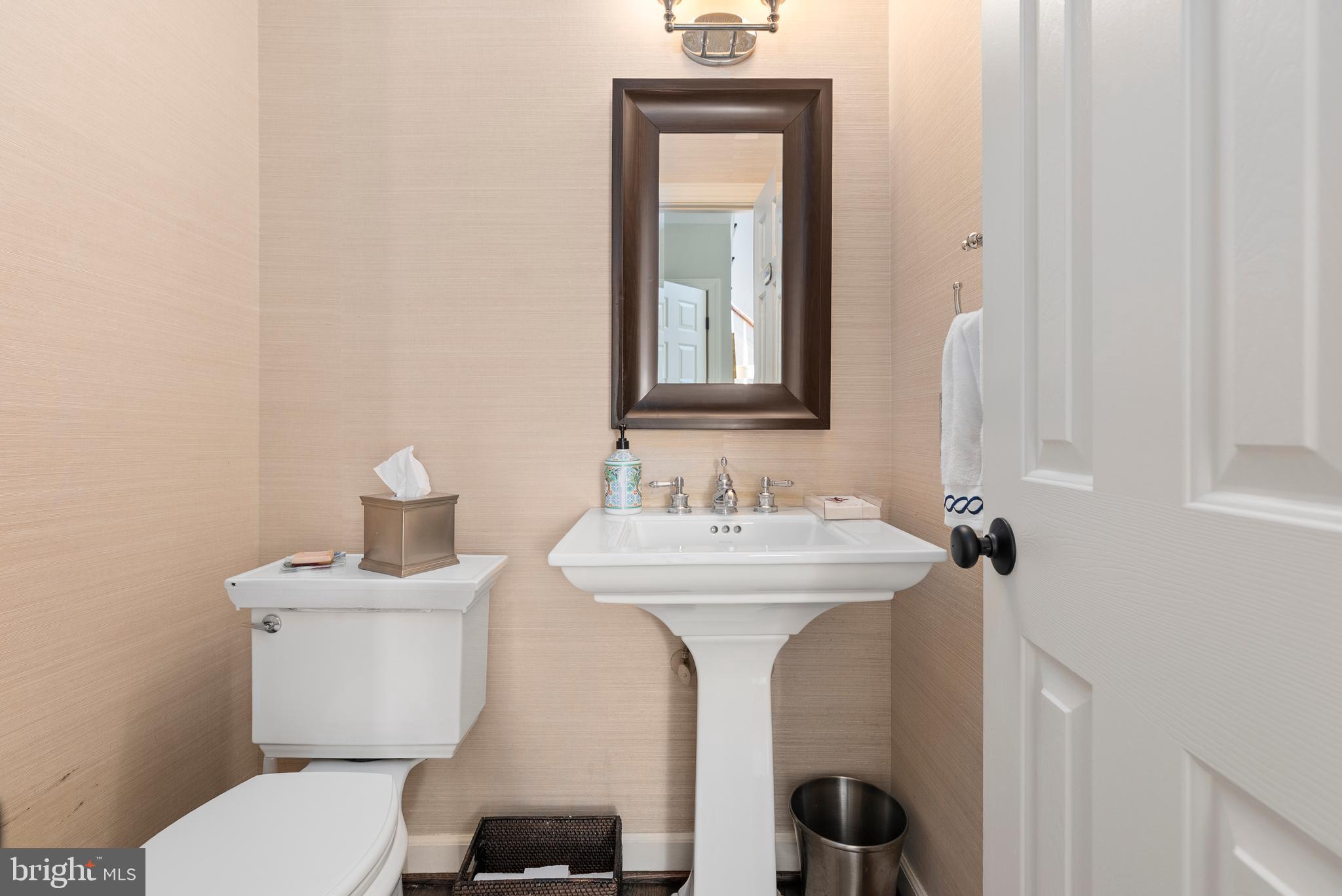 7 Redtree Lane Reisterstown, MD 21136 - Photo 28 of 56 a bathroom with a sink a toilet and mirror