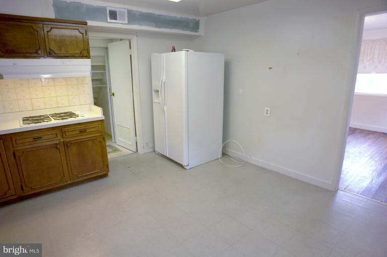 7530 Brink Road Gaithersburg, MD 20882 - Photo 14 of 30 Kitchen is open to the dining & laundry rooms.