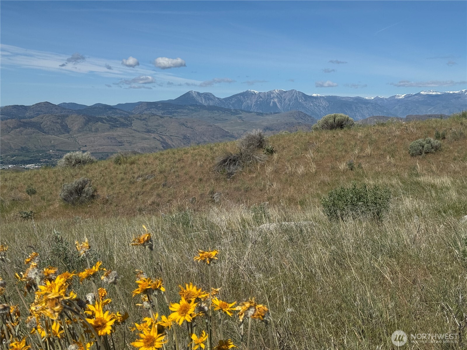 35 Sunset Ridge Road Oroville, WA 98844 - Photo 11 of 18 a view of mountain with sunset in background