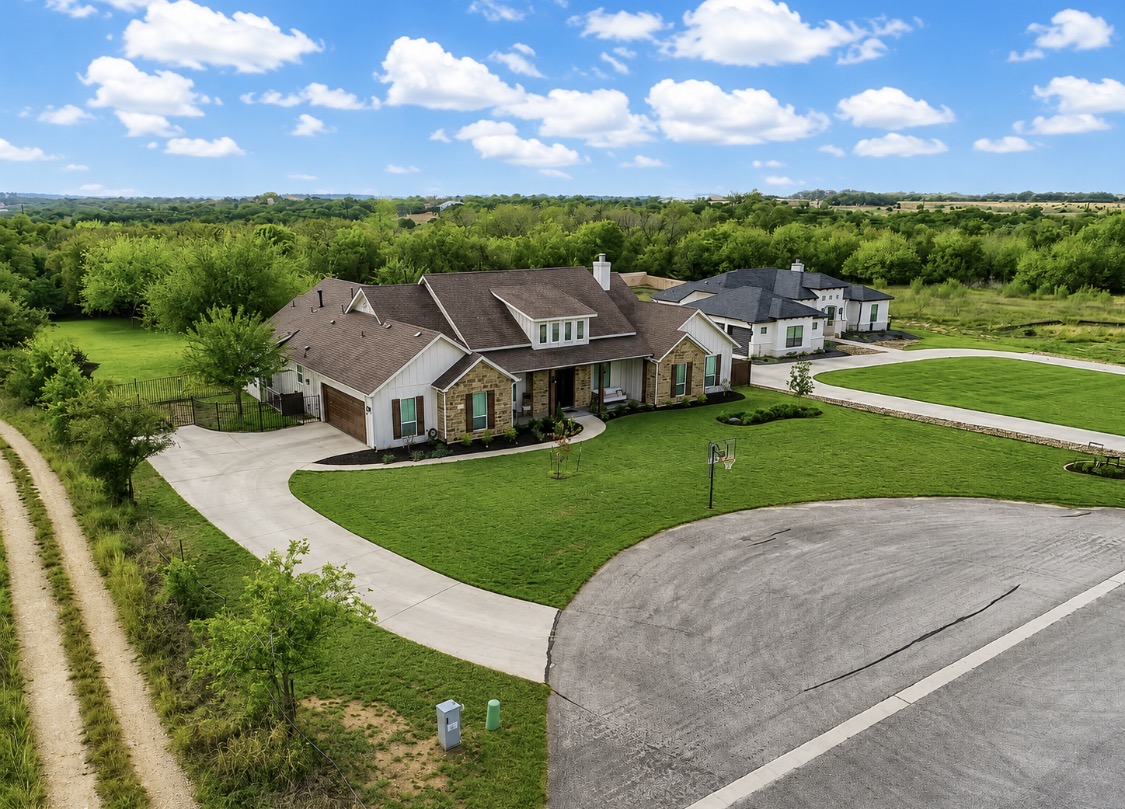 132 Huerta Road Florence, TX 76527 - Photo 36 of 38 an aerial view of a house with a yard