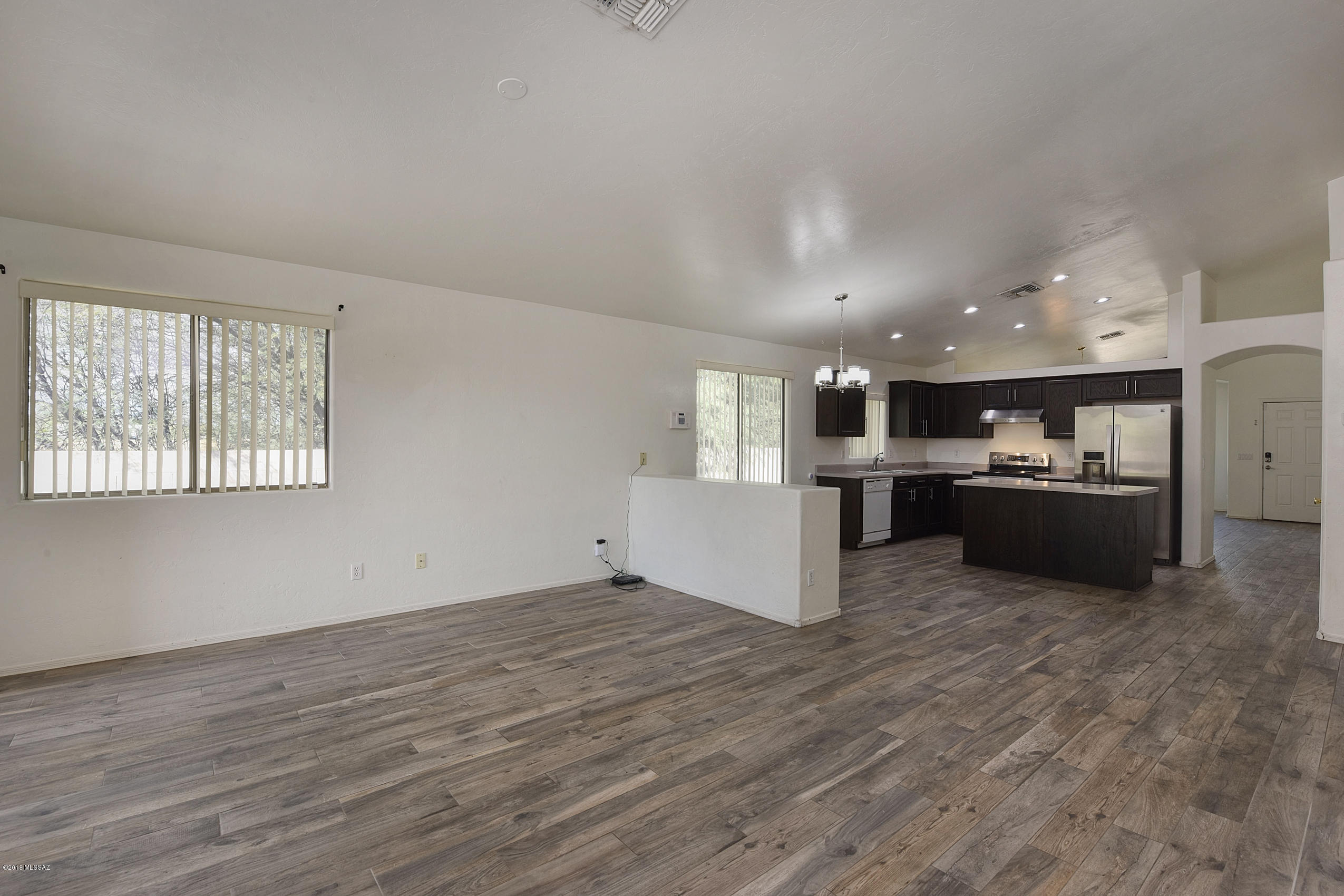 4328 South Valley Road Tucson, AZ 85714 - Photo 7 of 29 a view of kitchen with wooden floor
