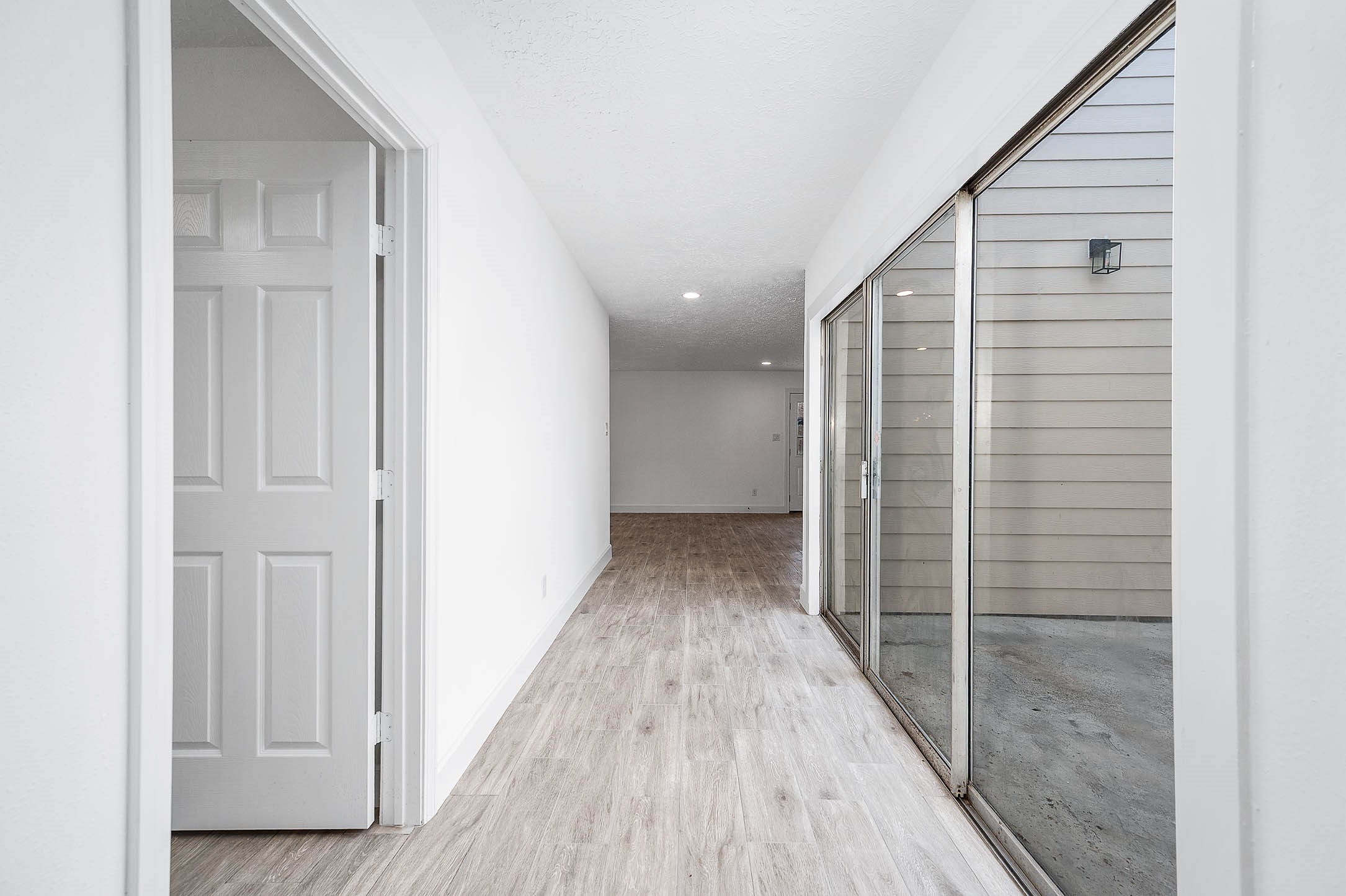 10402 Rancho Bernardo Lane Sugar Land, TX 77498 - Photo 15 of 30 a view of hallway with wooden floor