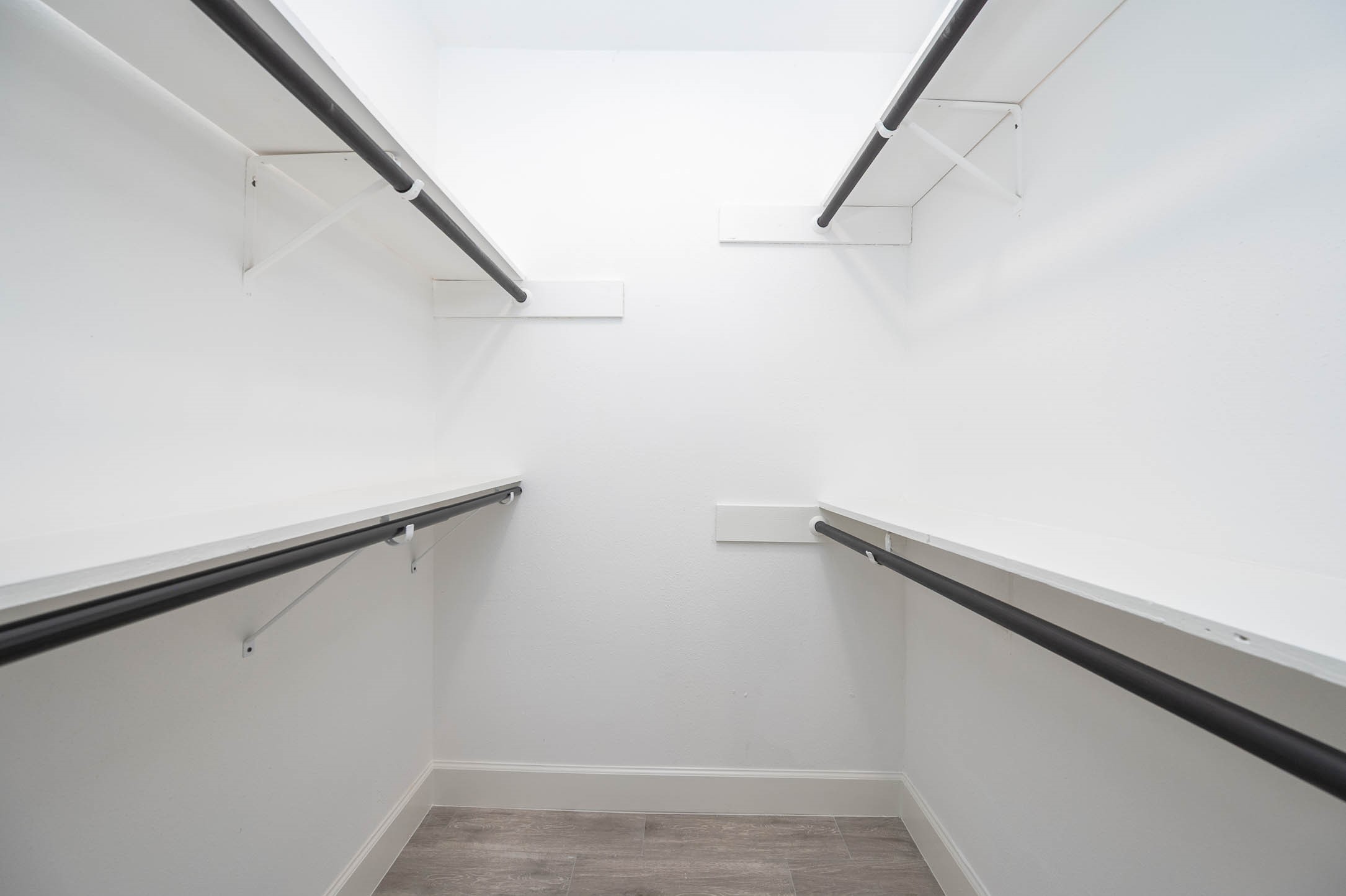 10402 Rancho Bernardo Lane Sugar Land, TX 77498 - Photo 23 of 30 a view of small space with racks on the wall