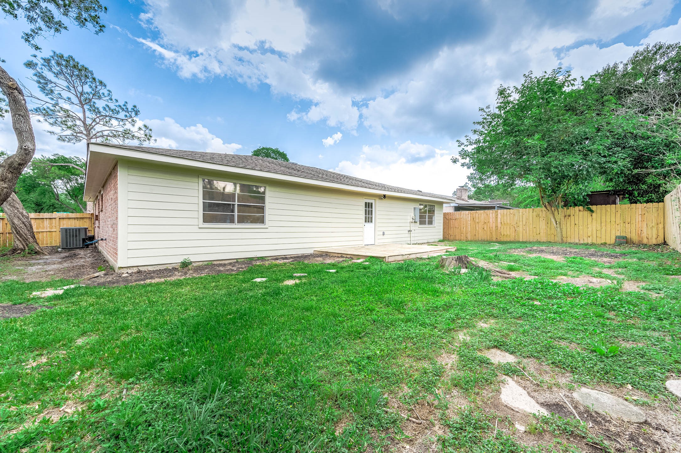 10402 Rancho Bernardo Lane Sugar Land, TX 77498 - Photo 29 of 30 a front view of house with yard and green space