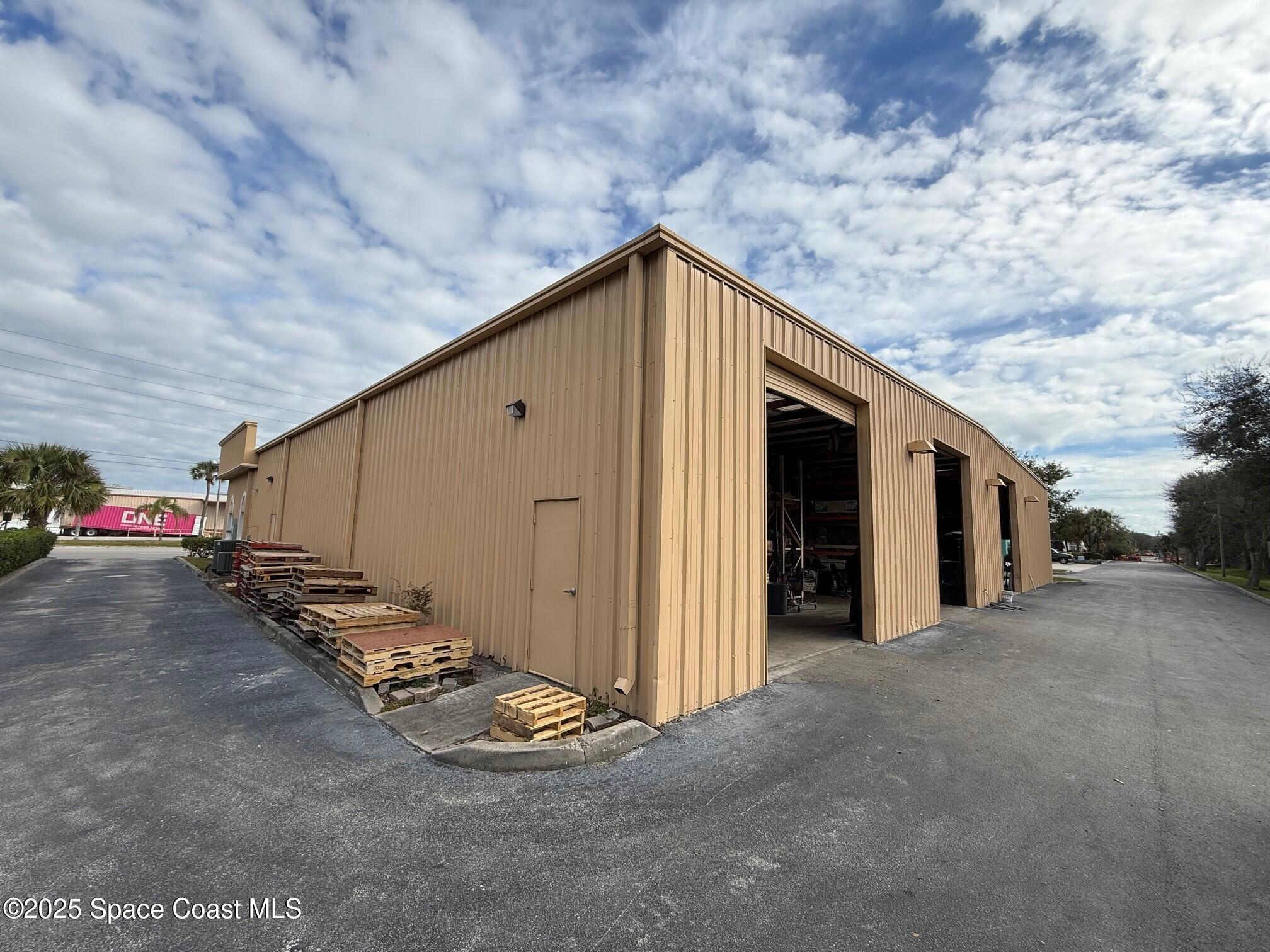 1301 Lake Washington Road Melbourne, FL 32935 - Photo 7 of 13 a view of a house with backyard