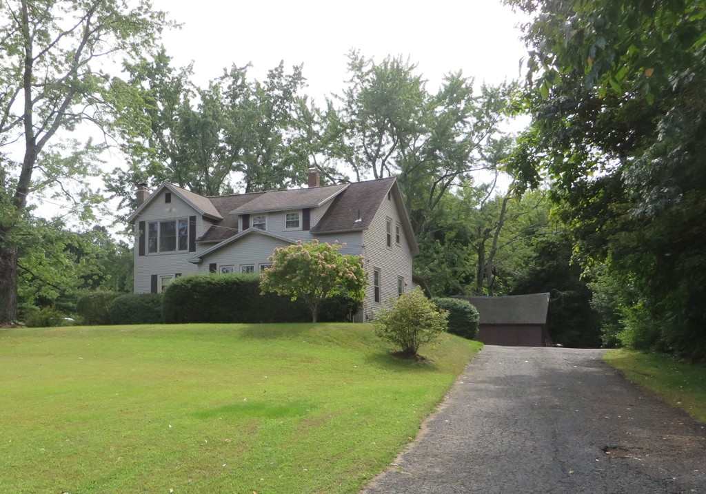 194 Turnpike Road Montague, MA 01351 - Photo 1 of 30 a front view of house with garden