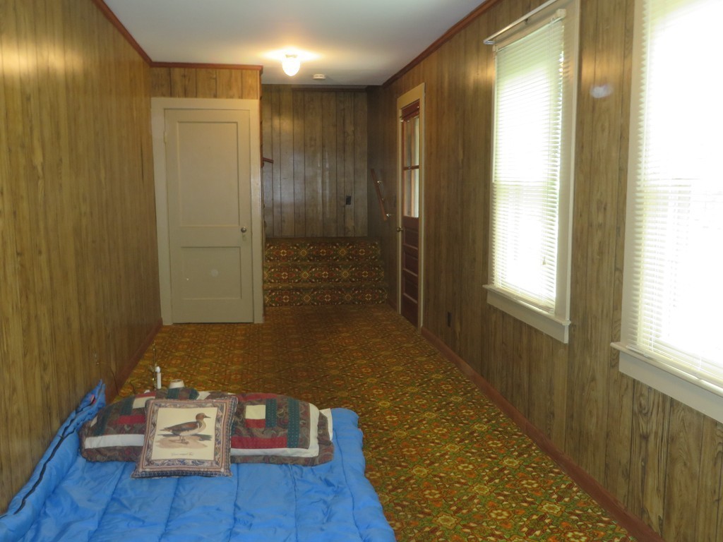 194 Turnpike Road Montague, MA 01351 - Photo 11 of 30 a living room with furniture and a wooden floor